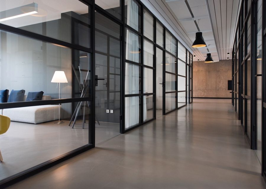 Steel-framed glazed doors and partitions in a commercial interior