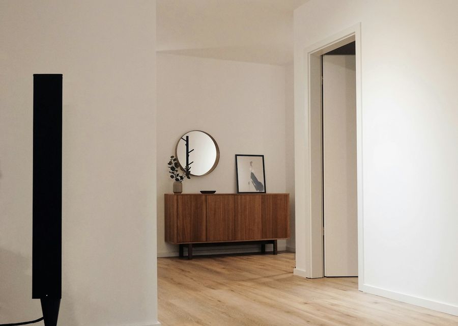 A finished interior with a warm timber floor