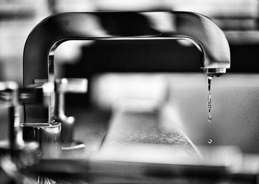 Close-up of a modern mixer tap and basin fitting
